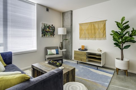 a living room with a couch and a coffee table